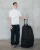 Torba podróżna na kółkach DB Hugger Roller 90L 6.png.webp