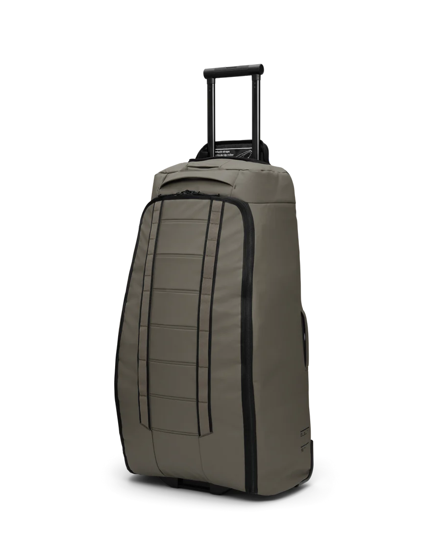 DB Hugger Roller 90L Torba podróżna na kółkach Zielona